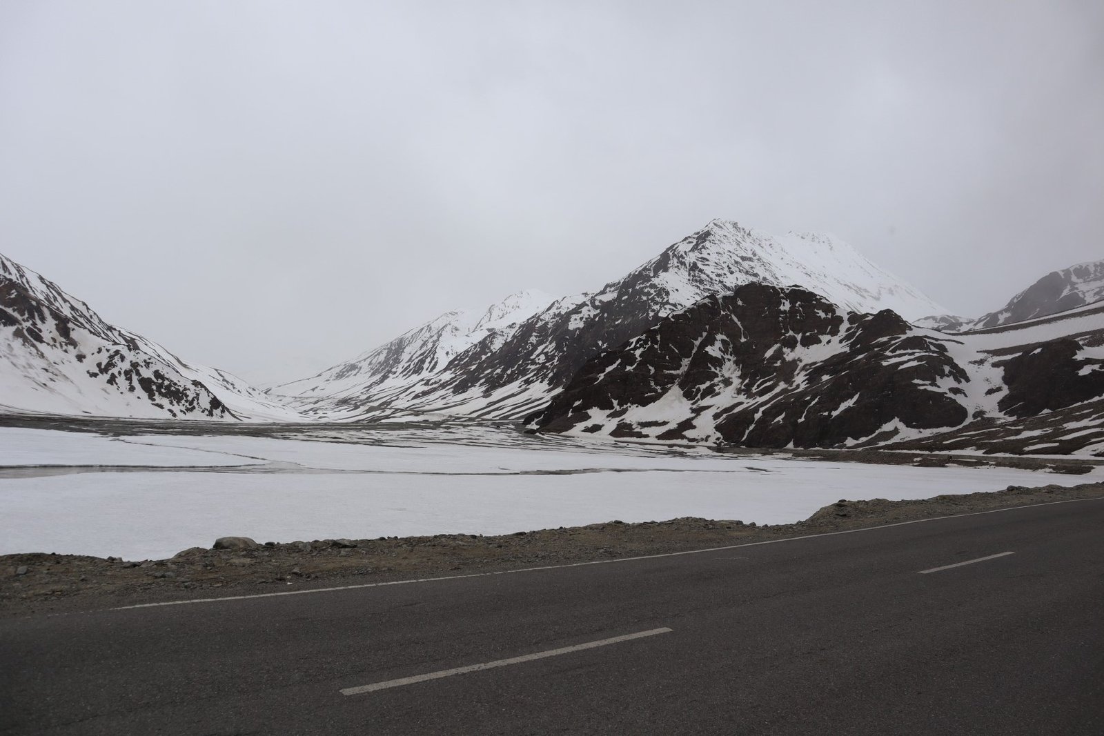 Leh Ladakh bike trip with snowy mountain roads and essential riding preparation