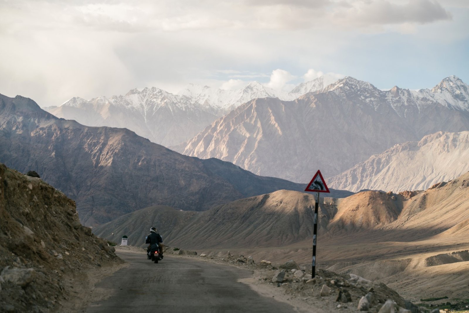 Leh Ladakh bike trip through a scenic mountain road in Ladakh